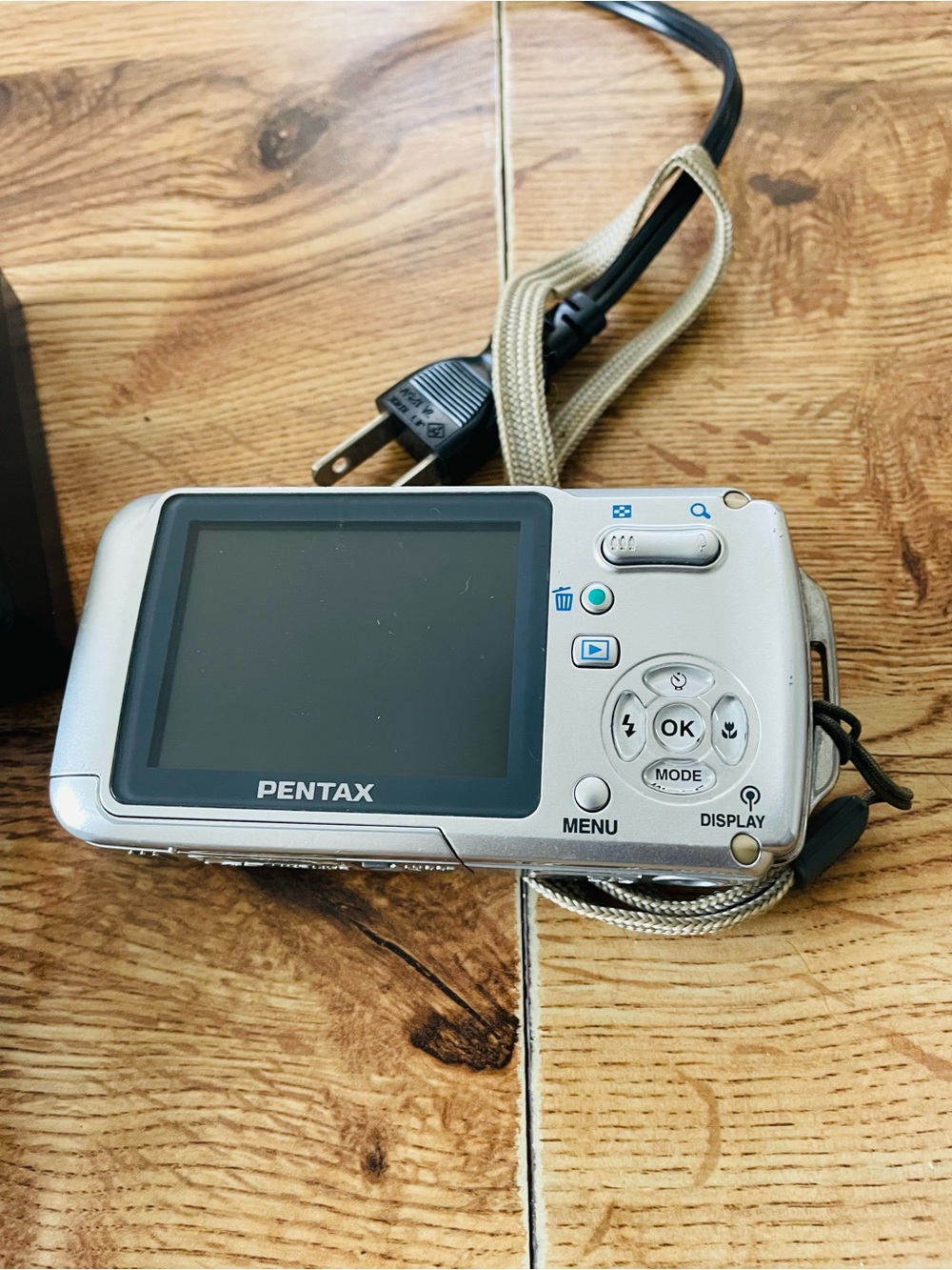 Pentax silver digital point-and-shoot camera